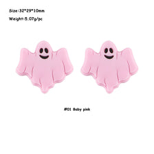 A set of five pink ghost-shaped silicone beads for jewelry making