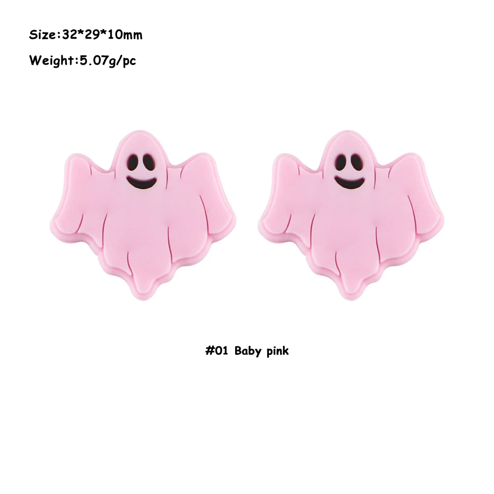 A set of five pink ghost-shaped silicone beads for jewelry making