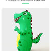 A bright green inflatable dinosaur punching bag for kids, shown in a realistic shot display.