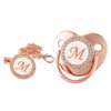Rose gold bling baby pacifier clip with silicone holder featuring a sparkling initial M