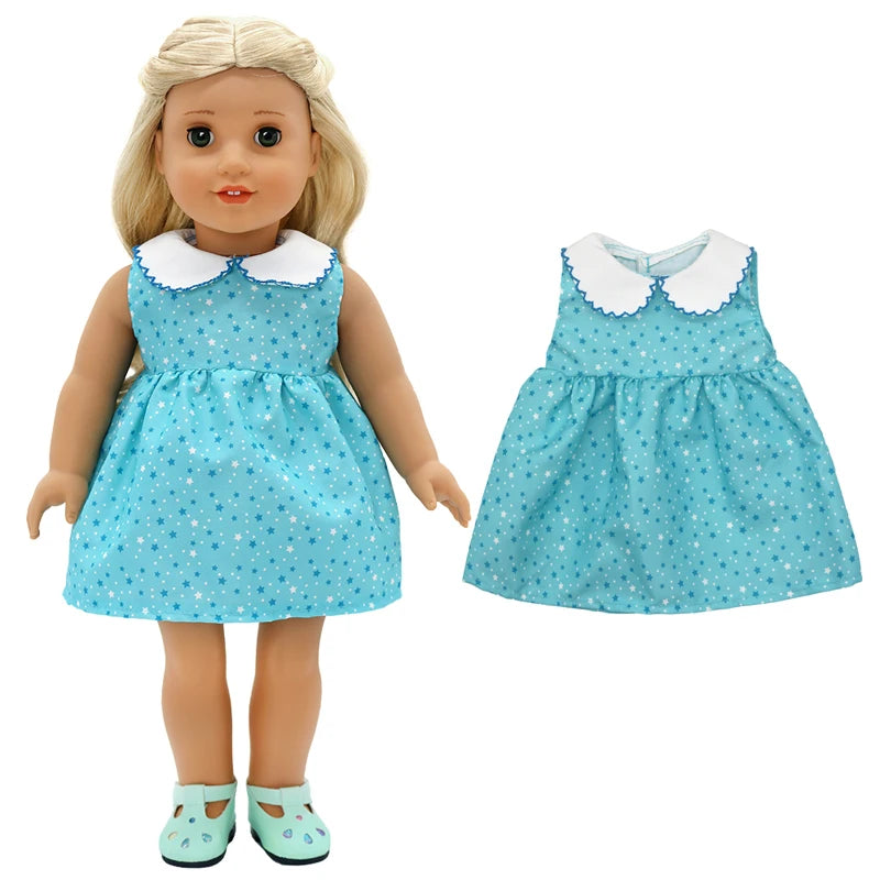 A blonde doll wearing a light blue polka dot dress with a white collar and matching tights.