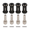 Four black plastic hex extenders and three silver metal rods for RC crawlers