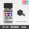 Tamiya XF-24 Dark Grey enamel paint in a glass bottle, labeled for model building.