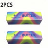 Two salted butter stick squishy toys in purple and yellow gradient colors.