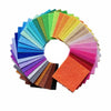 A colorful fan of vibrant felt fabric sheets in various shades of green, blue, yellow, orange, and pink.