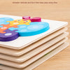 Stack of wooden puzzle pieces shaped like cartoon dinosaurs and other animals for baby play
