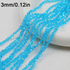 A close-up of bright blue crystal triangle beads strung together for jewelry making.