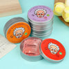 A stack of Wen-Qing Slime Studio containers and an open container of orange slime with a wizard face design.