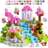 A set of pink and pastel magnetic building blocks used to construct a castle structure.
