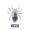 A glittery, laser-reflective soft bait fishing lure resembling a spider is shown against a white background.