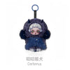 A small, dark blue furry collectible figure of Cerberus with white hair and a silver ring.