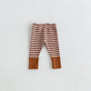 Brown and white striped baby leggings with a tan cuff