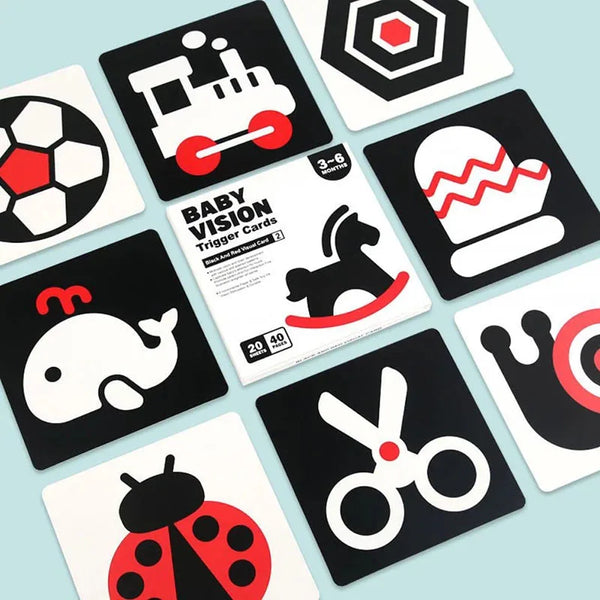 A collection of black and white Montessori flash cards featuring various shapes and objects for early development.