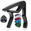 A black guitar capo set including a holder, picks, and accessories.