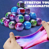 A hand holds a translucent, colorful slime stretched into a ribbon shape next to a pile of iridescent, spherical slime balls.