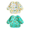 A set of two waterproof full sleeve baby bibs featuring a yellow and green pattern for feeding.