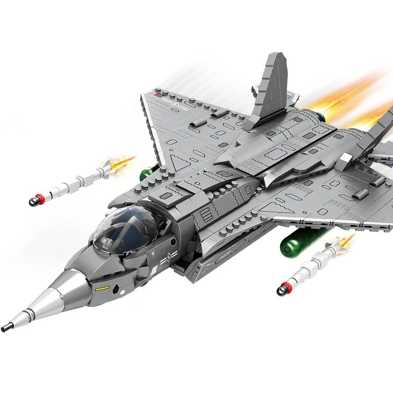 A detailed gray J35 fighter jet model kit built from building blocks, shown in flight with missile trails.
