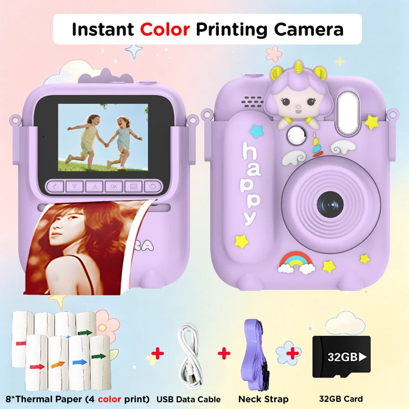 A pink instant color printing camera with a lens, paper, USB cable, and 32GB card visible.