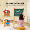 A girl is using a double-sided magnetic art easel with a chalkboard and whiteboard for organized storage of art supplies.