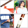 A traditional Chinese bamboo flute (dizi) with a brass joint, shown in various close-up shots and in use.