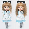 A pair of dolls wearing vintage lace maid dresses with black bows and striped stockings.