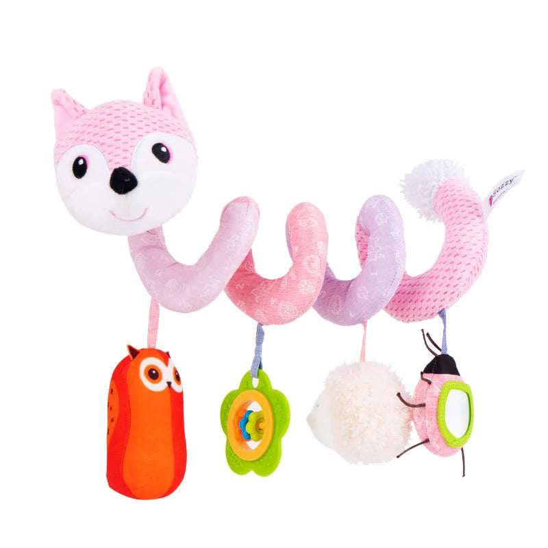 A pink spiral elephant sensory toy with a white face and orange body hanging from a string.