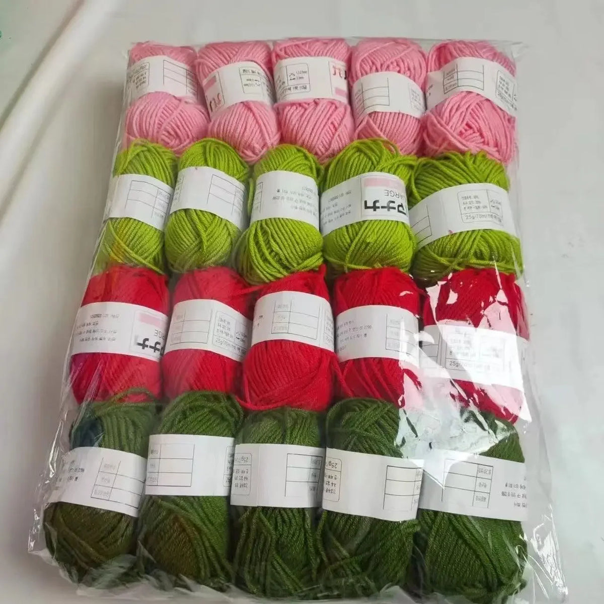 A pack of 20 skeins of milk cotton blend yarn in various colors for knitting and crochet projects.