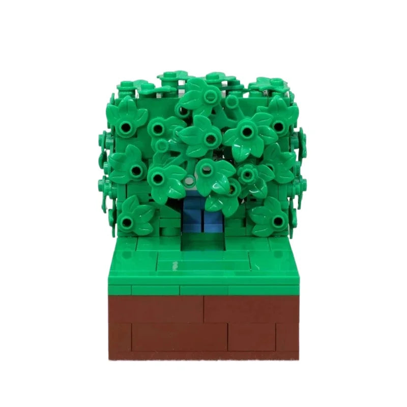 A LEGO building block model of Homer in the bushes scene featuring green foliage and a brown base.