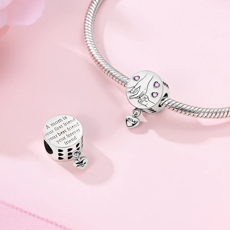 Sterling silver heart charm beads for bracelets featuring a detailed animal design and text engraving