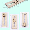 A wooden Montessori busy board featuring a carved elephant silhouette and a wavy cutout for sensory learning.