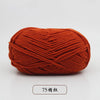 A ball of orange pre-dyed milk cotton yarn, 50g, used for knitting and crochet.