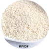 A pile of white 1.5mm solid glass seed beads for jewelry and craft.