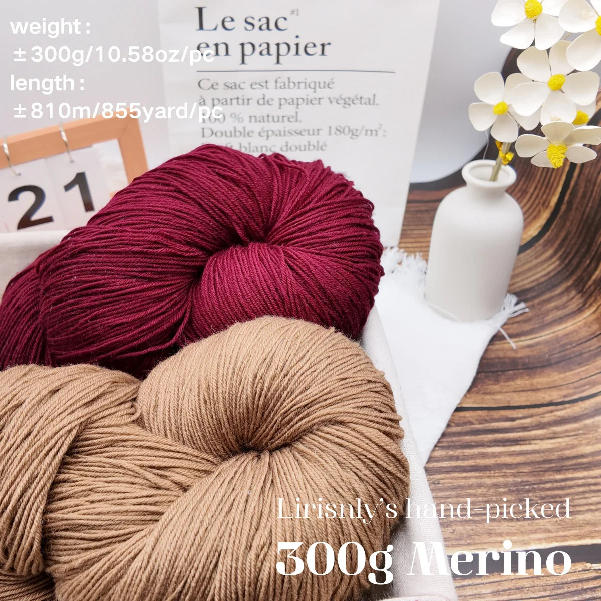 A close-up of a skein of 300g Merino wool yarn in a light tan color, displayed next to product information.