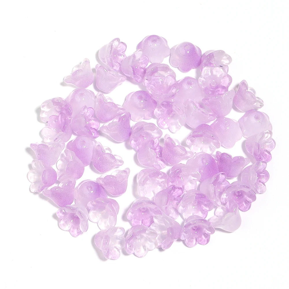 A pile of 50 clear purple cherry blossom flower glass beads for jewelry making