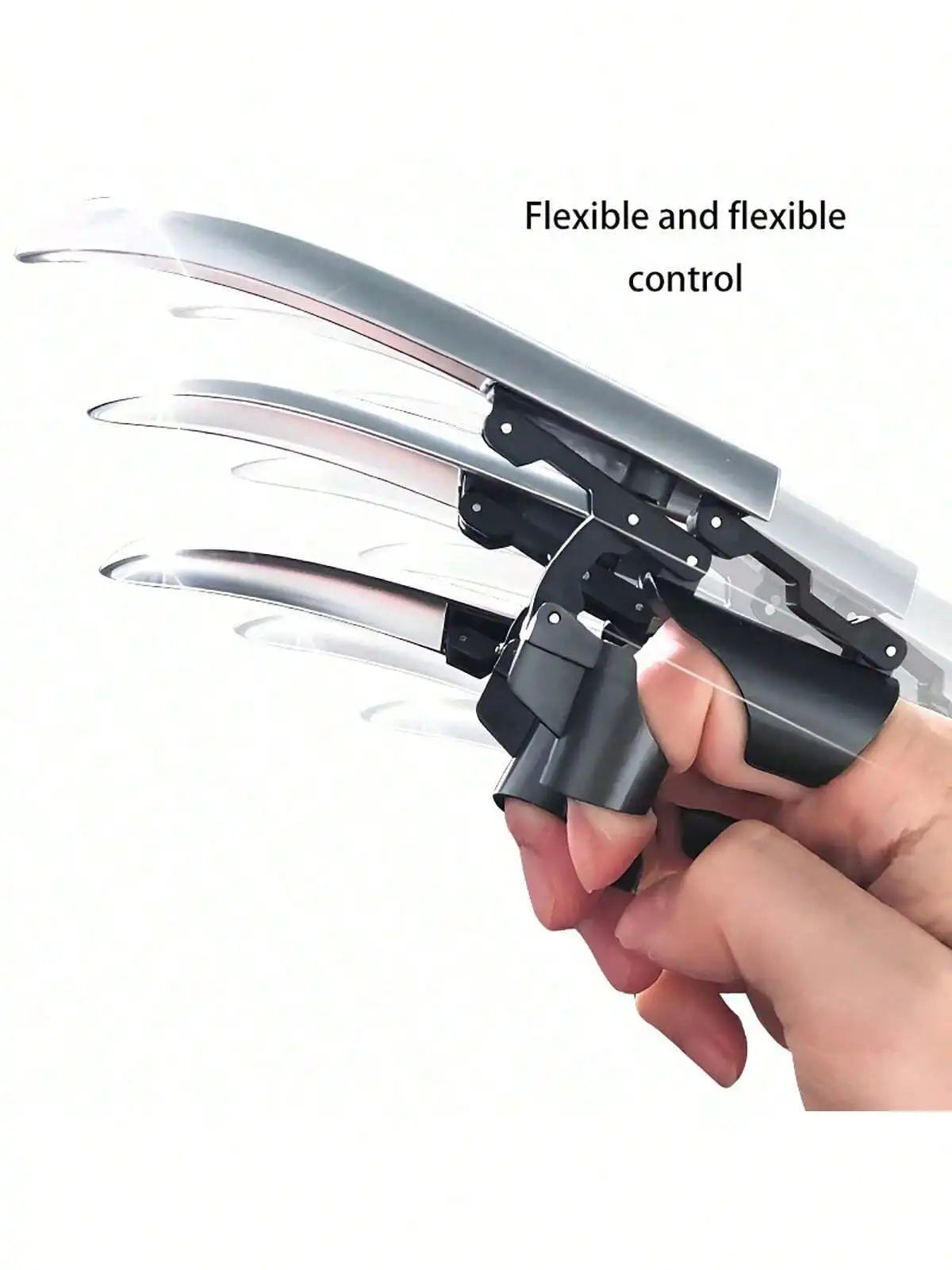 A hand is demonstrating a flexible mechanical wolf claw prop with silver and black components.