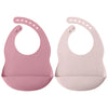 A pair of pink waterproof silicone baby bibs with adjustable necks shown against a white background.