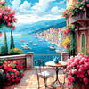 A vibrant painting of a seaside harbor with colorful boats, buildings, and lush pink flowers in a Mediterranean setting.