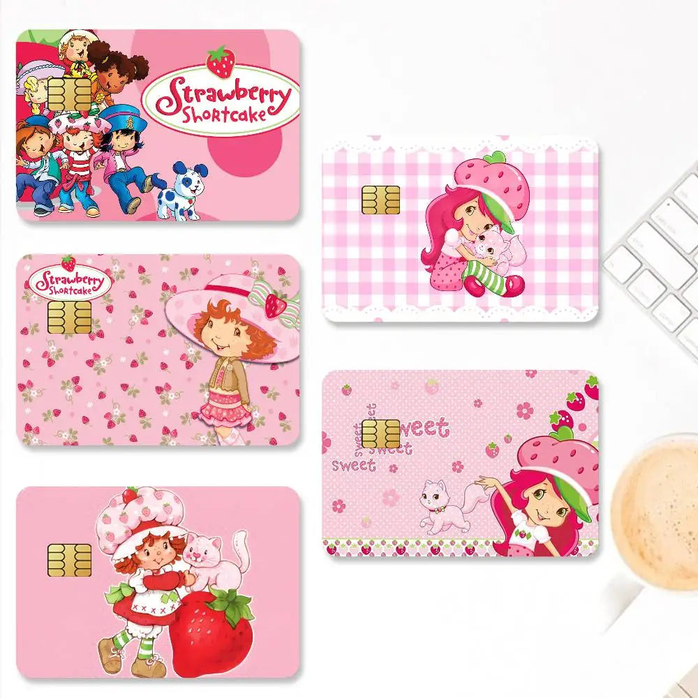 A set of four pink and white cartoon credit card stickers featuring Strawberry Shortcake characters.