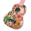 A pink ukulele featuring a Hawaiian design with a woman playing the instrument surrounded by tropical flowers and palm leaves