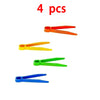 Four plastic sorting tools or tweezers in various colors are shown for a Montessori learning toy.