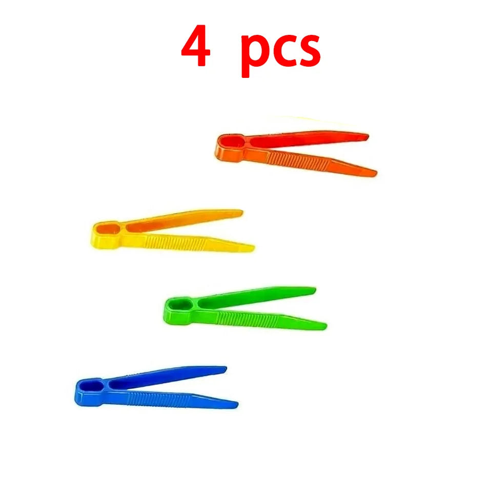 Four plastic sorting tools or tweezers in various colors are shown for a Montessori learning toy.