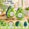 Handmade crochet avocado green doll with a motivational message