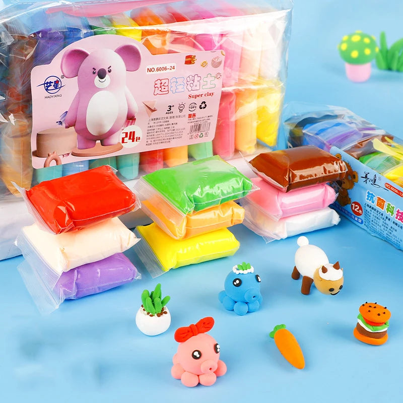 A colorful set of air dry modeling clay with various sculpting tools and small food-themed shapes.