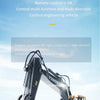 A close-up of a yellow remote control construction excavator truck with an attached hydraulic arm, being operated by a hand.
