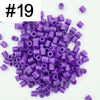 A pile of 1000 purple DIY fuse beads, 5mm in size, for creative craft projects.