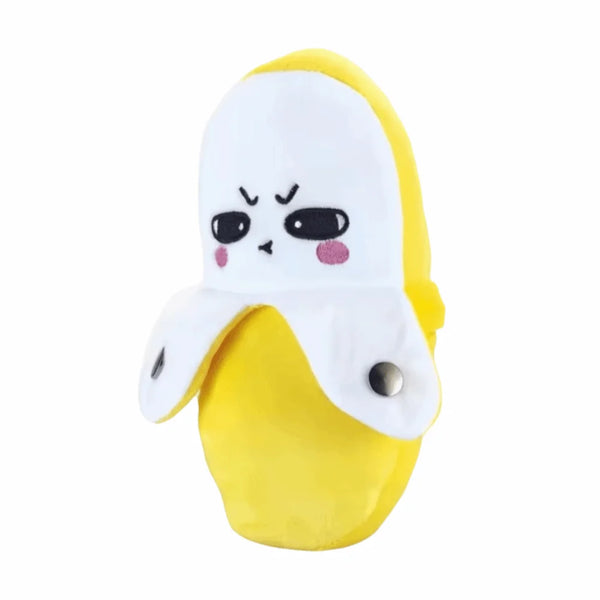 A plush toy shaped like a banana with a white face and yellow body.