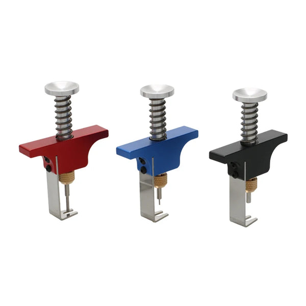 A set of three precision propeller remover tools in red, blue, and black for FPV drones