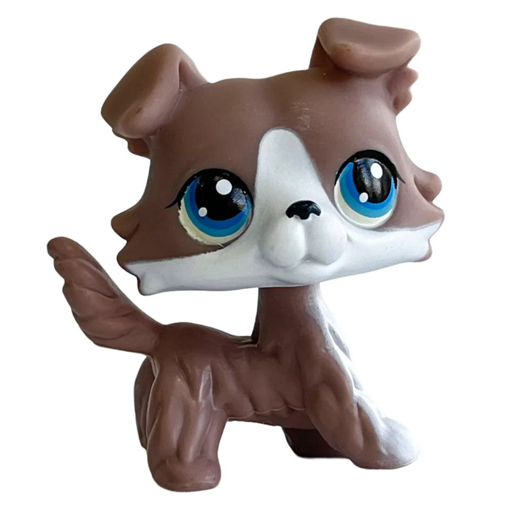 Sammler-Katzenfigur mit braun-weißem Fell und großen blauen Augen