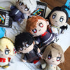 A collection of anime character plushies and pendants featuring characters from various series.