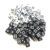 A pile of black and white 10mm six-sided dice for games and decision making